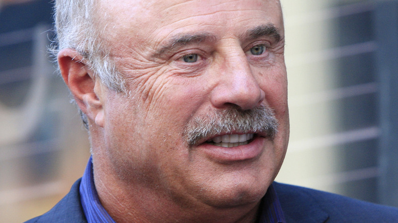 Dr. Phil McGraw looking away