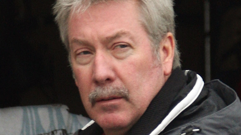 Drew Peterson in front of garbage can in 2007.