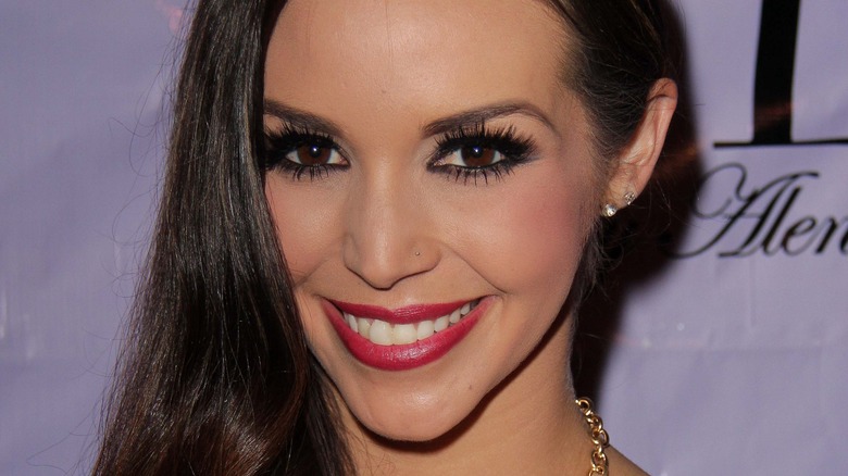 Scheana Marie smiles looking down
