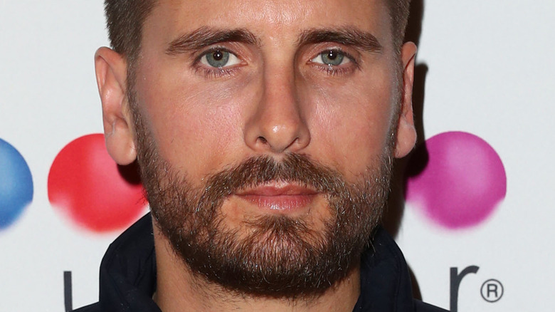 Scott Disick looks stern on the red carpet