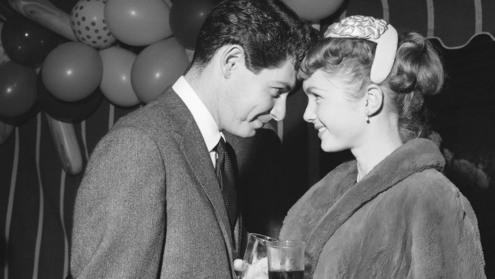 Debbie Reynolds and Eddie Fisher attending film producer Mike Todd's party on October 15, 1955