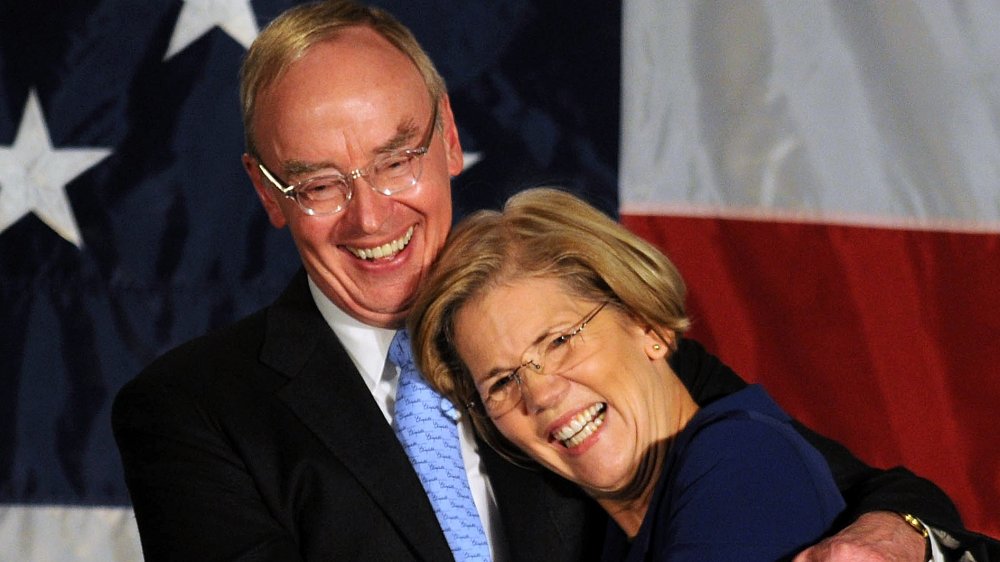 Elizabeth Warren waves to the crowd after her acceptance speech after beating incumbent U.S. Senator Scott Bown