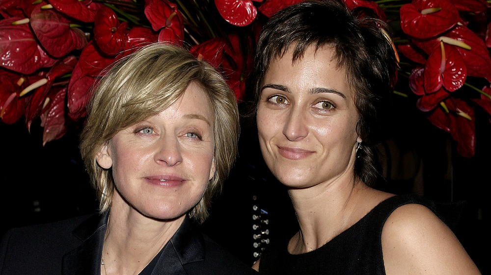 Ellen DeGeneres and Alexandra Hedison smiling