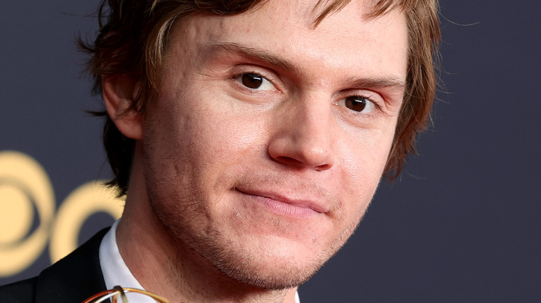 Evan Peters, half smiling