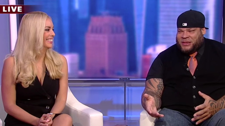 Britt McHenry and Tyrus during an interview