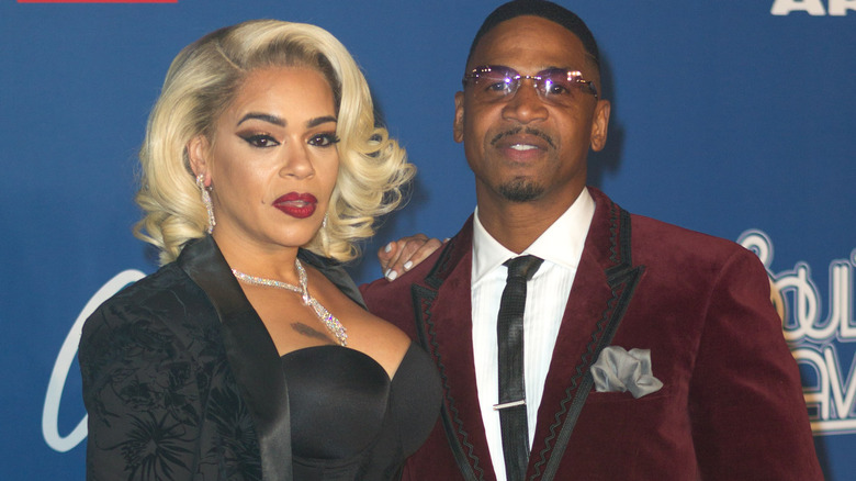 Stevie J and Faith Evans on red carpet 
