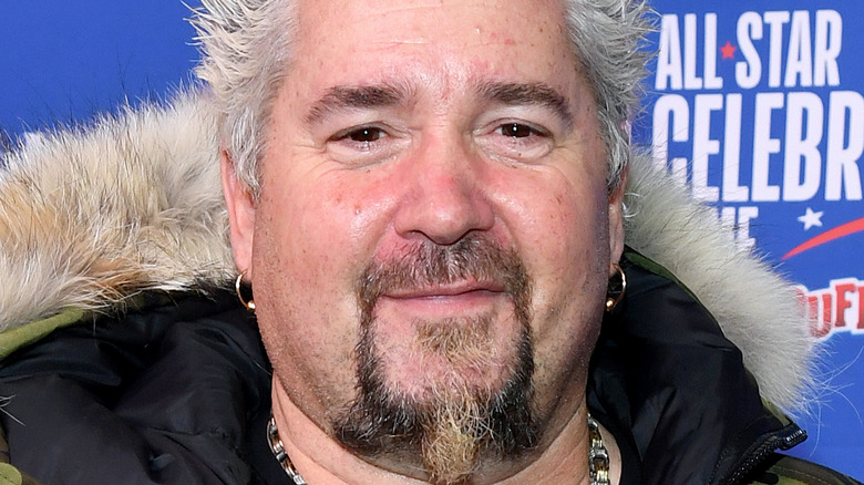 Guy Fieri at a basketball game