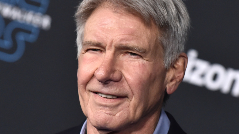 Harrison Ford posing on the red carpet