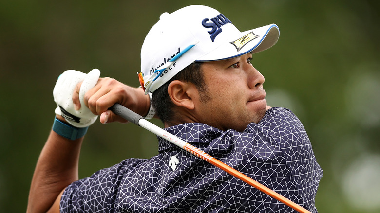 Hideki Matsuyama golfing in 2021 