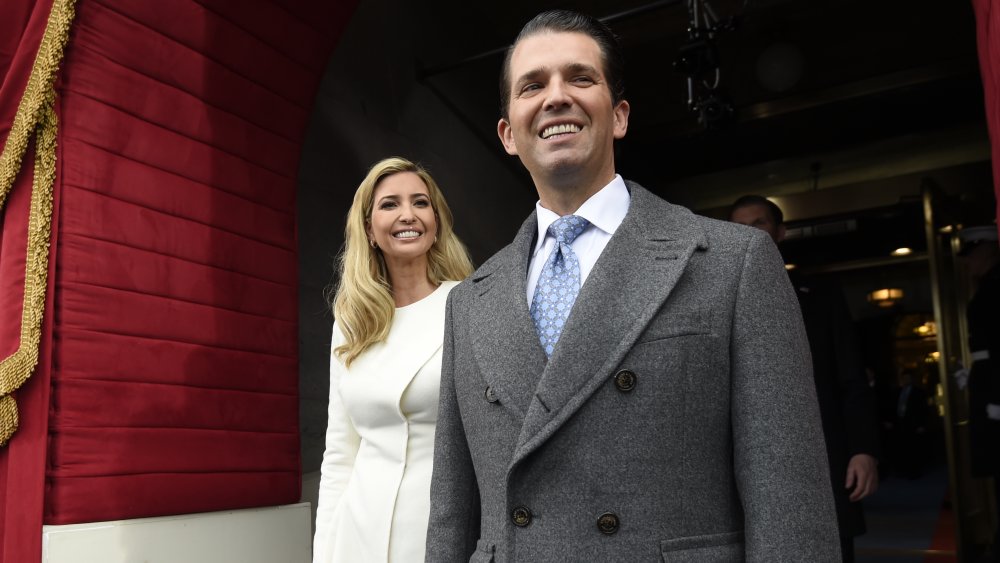 Ivanka Trump and Donald Trump Jr. walking and smiling