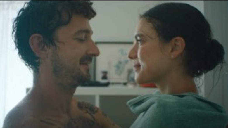 Shia LaBeouf and Margaret Qualley in music video for "Love Me Like You Hate Me"