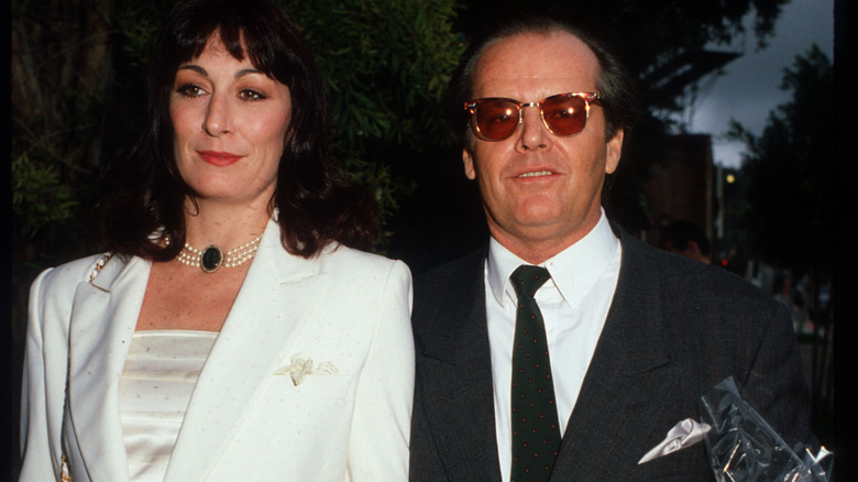 Jack Nicholson and Anjelica Huston frowning 