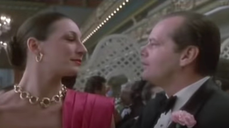 Anjelica Huston and Jack Nicholson flirting in Prizzi's Honor