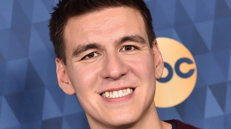 James Holzhauer smiles at an event