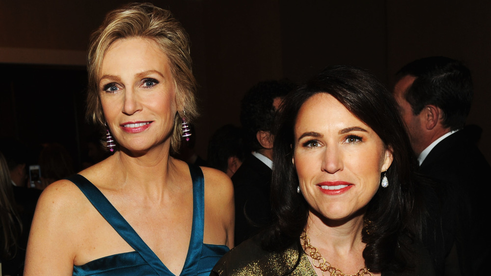 Jane Lynch and Lara Embry smiling