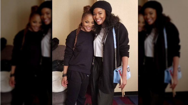 Janet Jackson and Gabrielle Union smiling