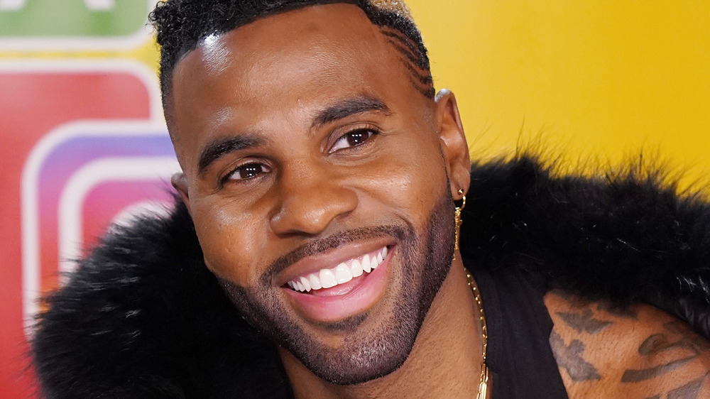 Jason Derulo smiling at an event