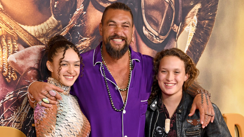 Jason Momoa posing with Lola and Nakoa-Wolf