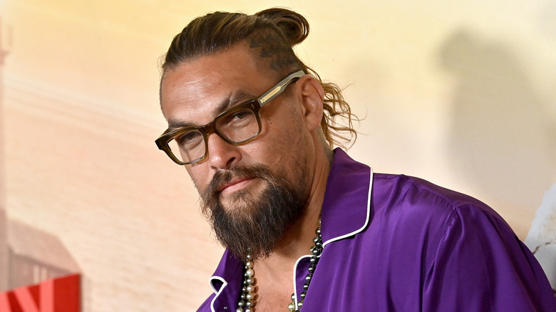 Jason Momoa wearing glasses