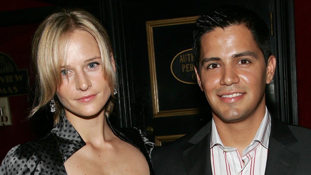 Daniella Deutscher and Jay Hernandez posing together at an event