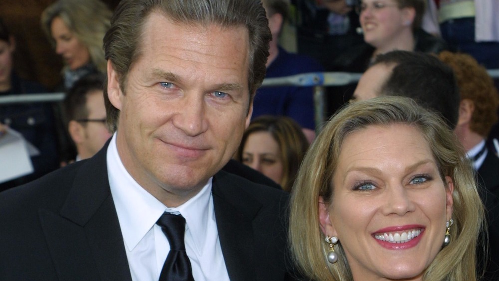 Jeff Bridges and Susan Geston smiling on the red carpet