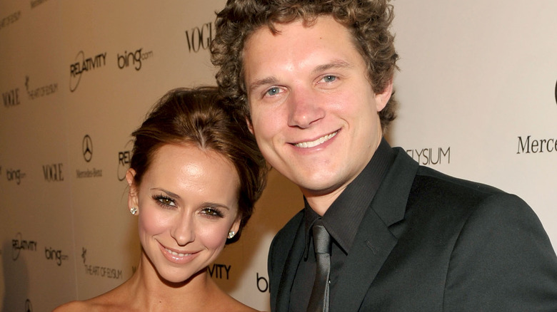 Jennifer Love Hewitt and Alex Beh smiling 