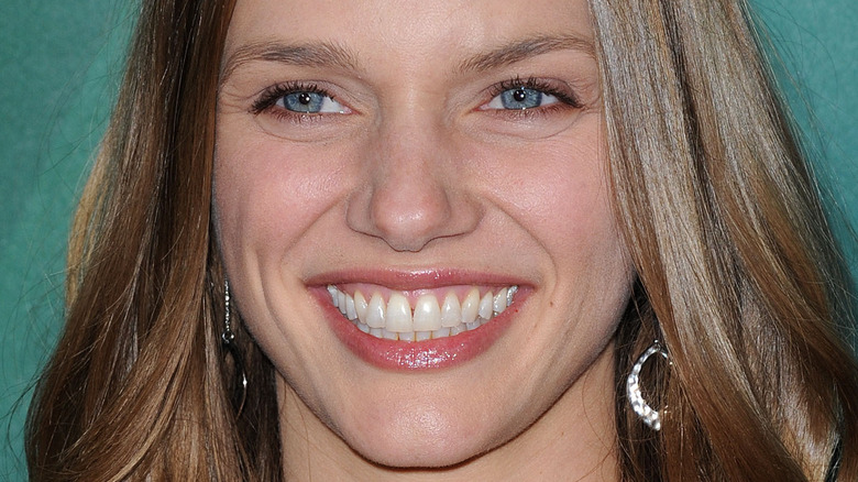 Tracy Spiridakos smiles