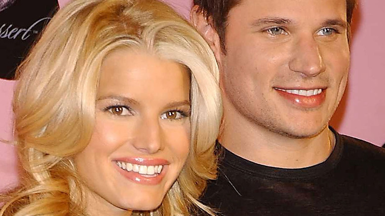 Jessica Simpson and Nick Lachey smile