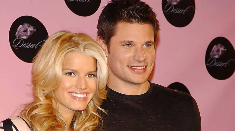Jessica Simpson and Nick Lachey smile