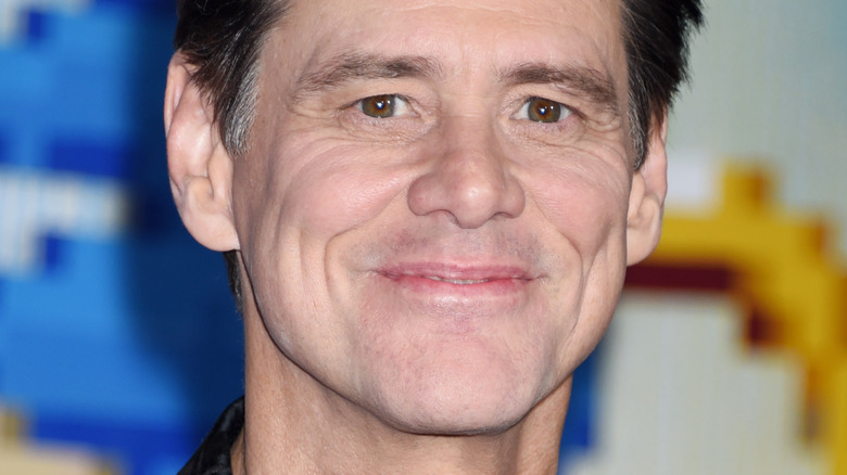 Jim Carrey smiles on the red carpet