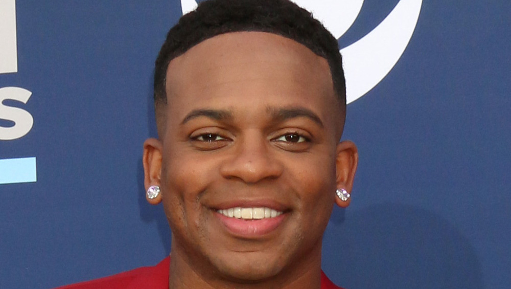 Jimmie Allen smiling