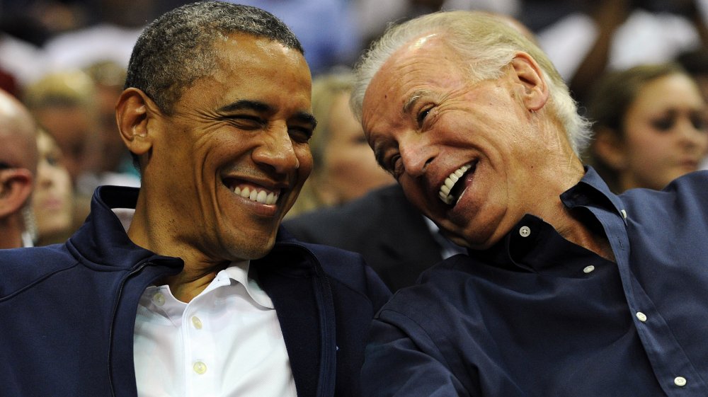 Barack Obama and Joe Biden laughing