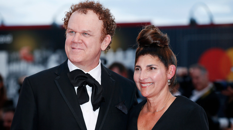John C. Reilly with wife Alison Dickey smiling