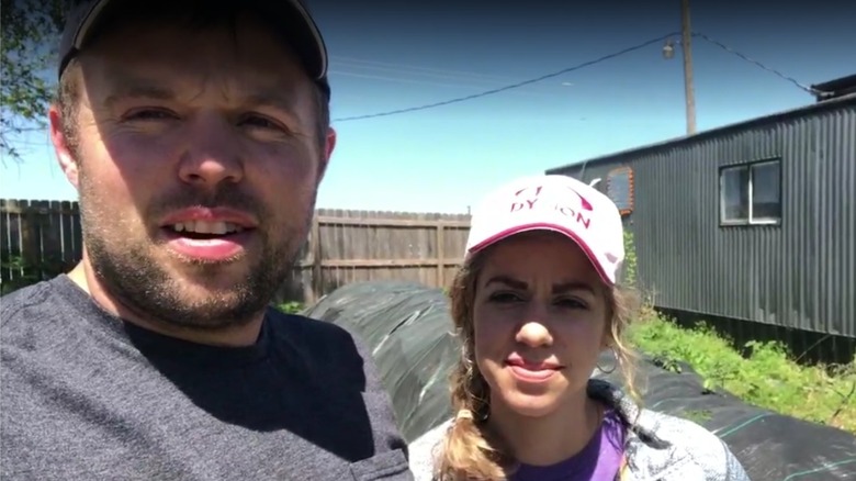 John David Duggar, wife outdoors