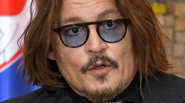 Johnny Depp receiving an award 