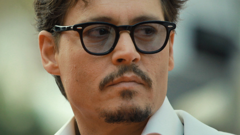 Johnny Depp black rimmed glasses goatee beard