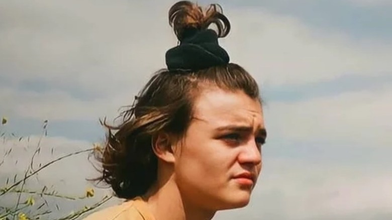Jack Depp sideways hair in top knott