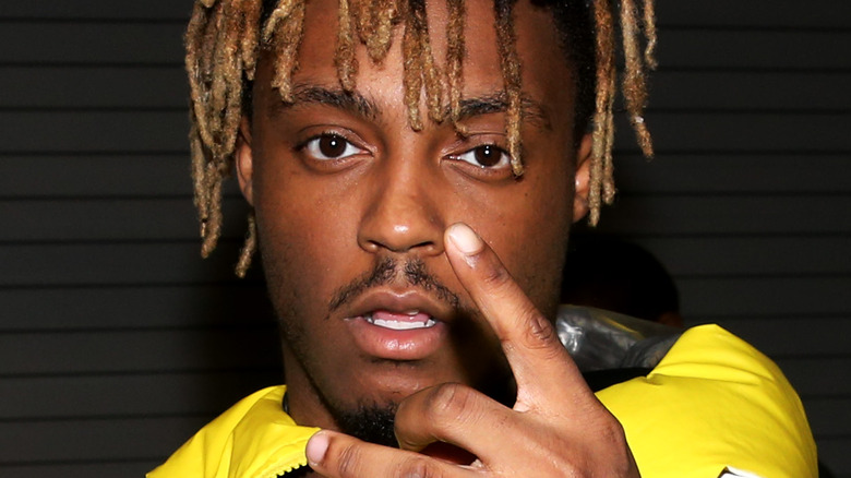 Juice WRLD posing at an event