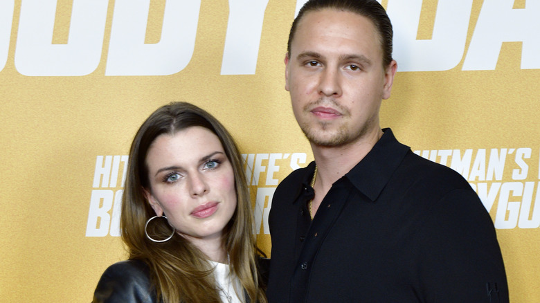 Julia Fox and Peter Artemiev posing in 2021