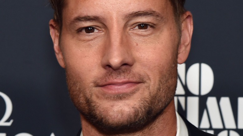 Justin Hartley looking into the camera