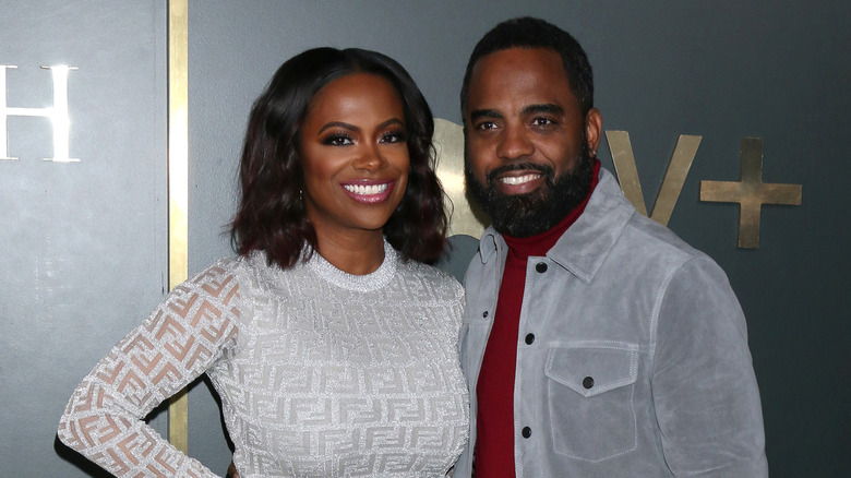 Kandi Burruss and Todd Tucker, both smiling