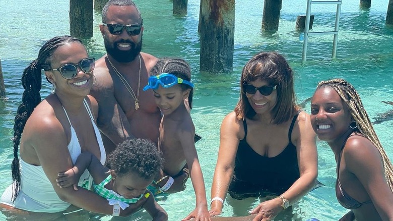 Kandi Burrus and Todd Tucker with Joyce Jones and their kids