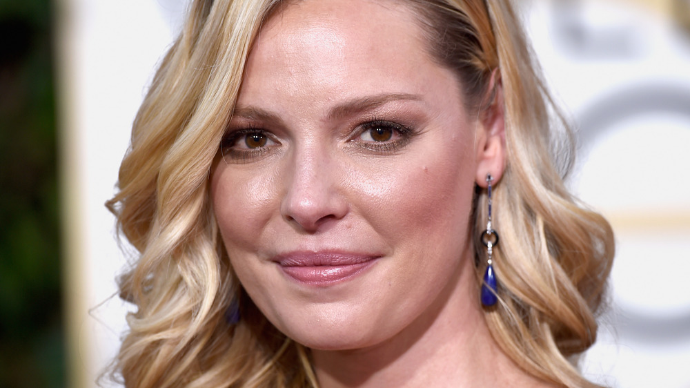 Katherine Heigl with a slight smile