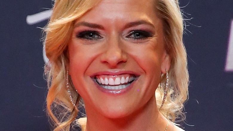 Kathryn Tappen smiles on the red carpet