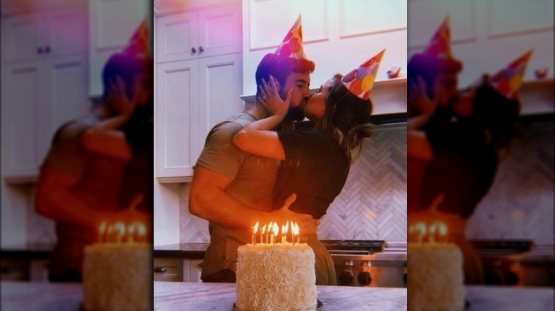 Katie and Blake birthday kissing