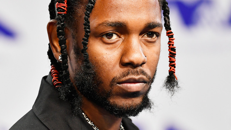 Kendrick Lamar wearing braids