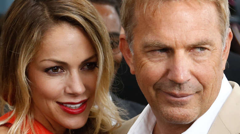 Christine Baumgartner and Kevin Costner smiling