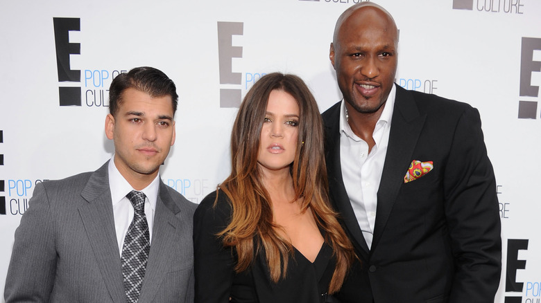 Rob Kardashian, Khloé Kardashian, and Lamar Odom posing together