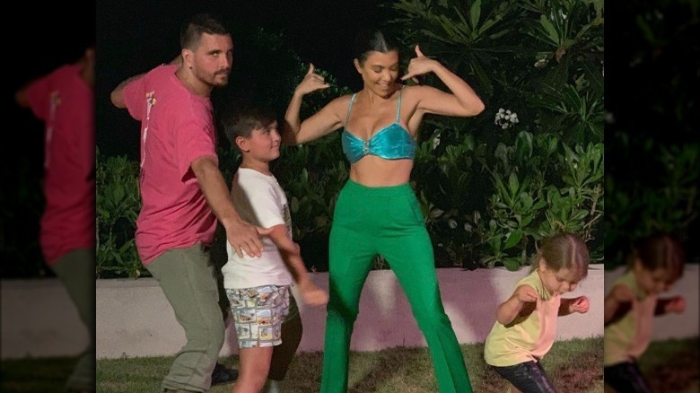 Scott Disick, Mason Disick, Kourtney Kardashian, and Reign Disick dancing