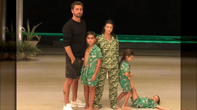 Scott Disick, Mason Disick, Kourtney Kardashian, Penelope Disick, and Reign Disick in matching outfits